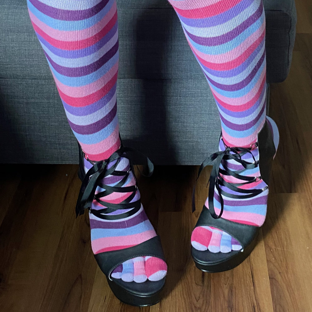 Knee-high stripy toe socks and high heels