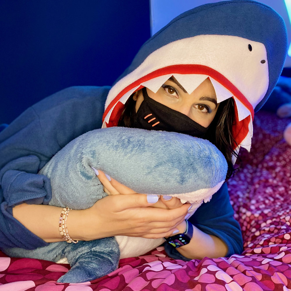 Shark costume pyjama, hugging IKEA shark. Blue nails and blue eyeshadow.