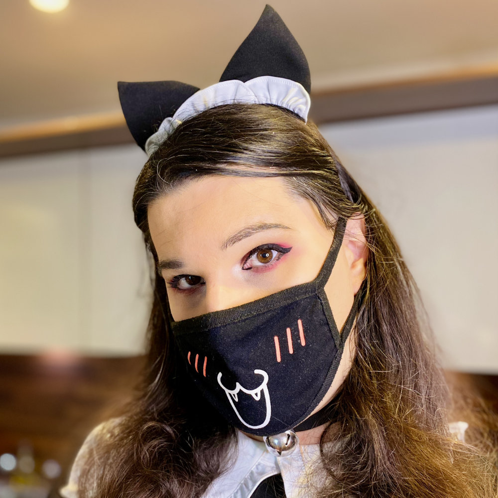 Portrait of Rina wearing cat maid ear headband, blouse, and collar, with light wing tip eye liner and pink eyeshadow