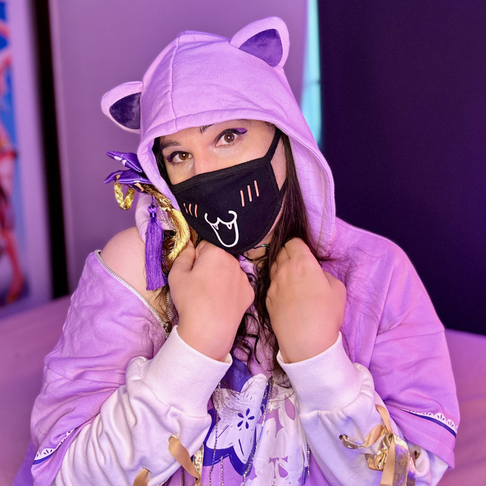 Rina wearing a purple hoodie with cat ears