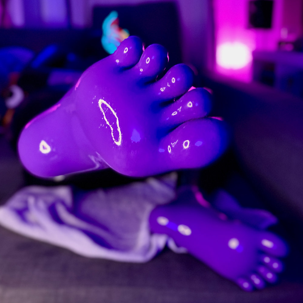 Close-up of the shiny soles of my Lavender latex toe socks